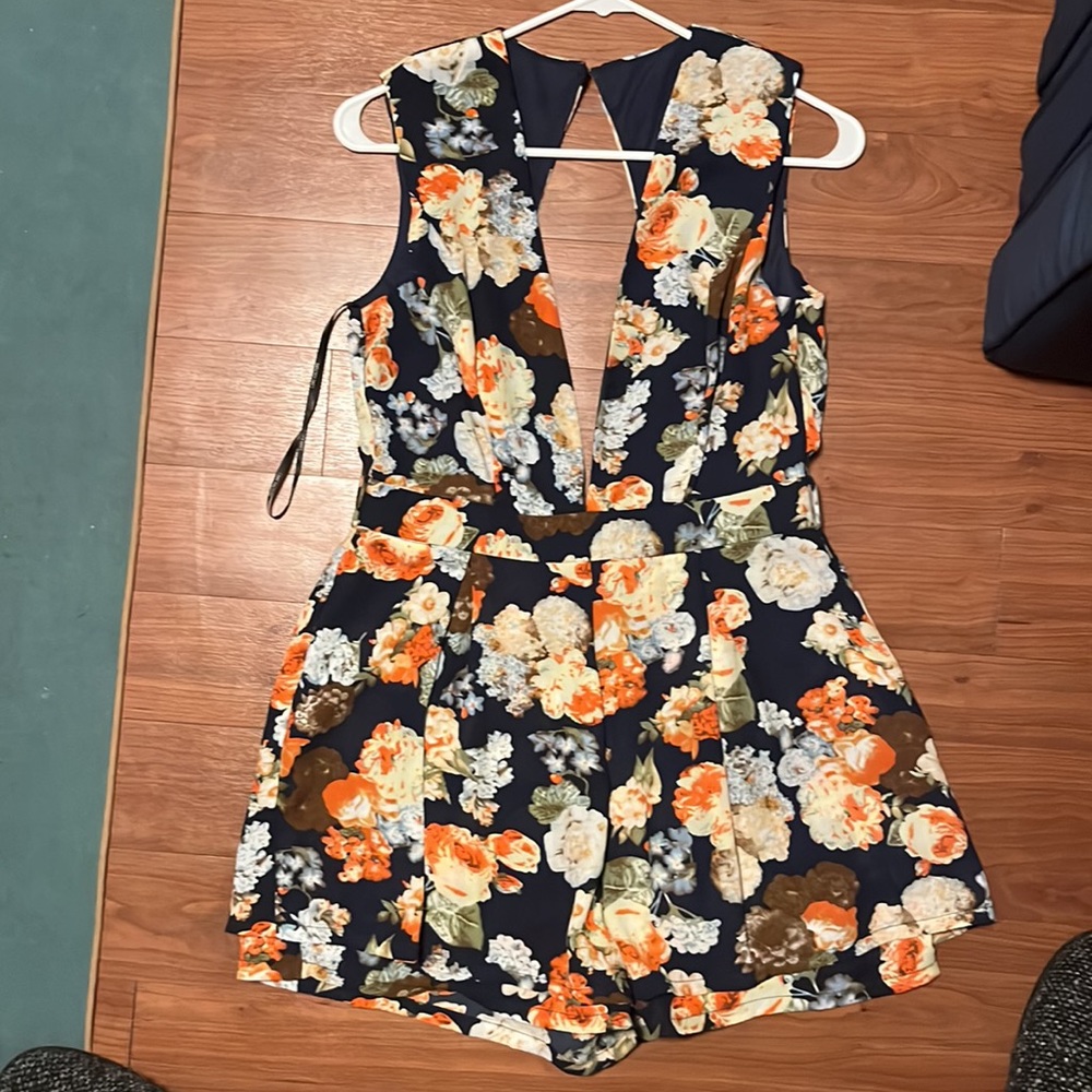 Deep v neck romper peep hole back